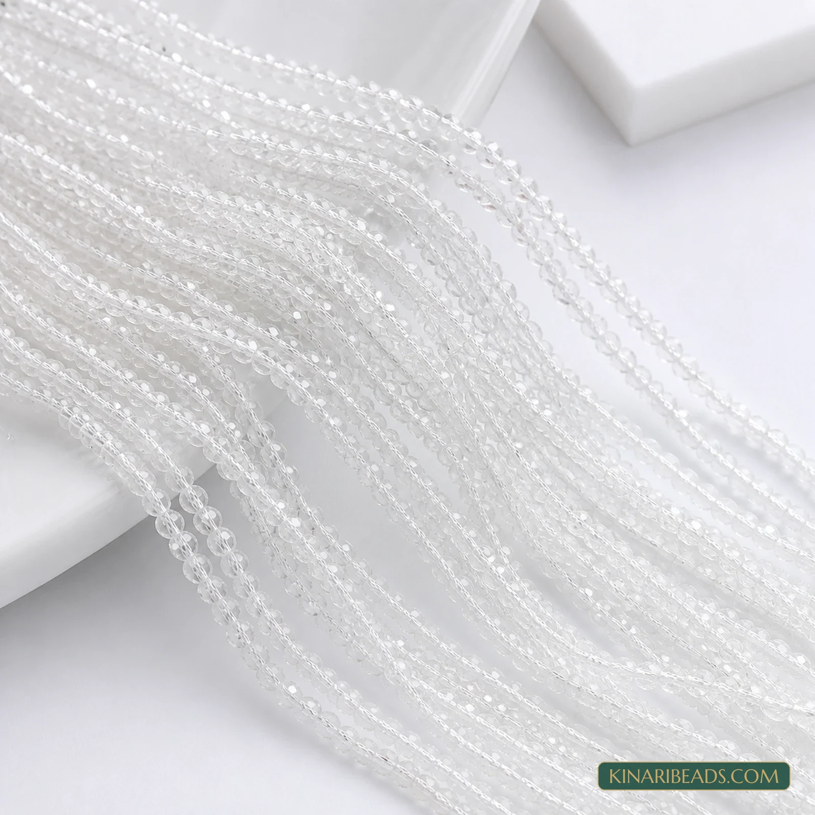 2mm Hydro Crystal Faceted Football Beads – Pack of 5 Strings - Clear colour