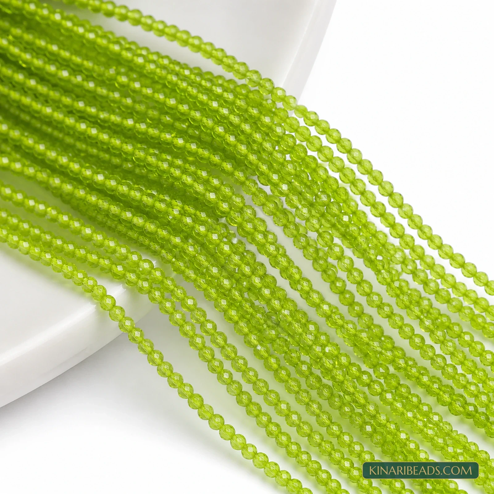 2mm Hydro Crystal Faceted Football Beads – Pack of 5 Strings - Light Green colour