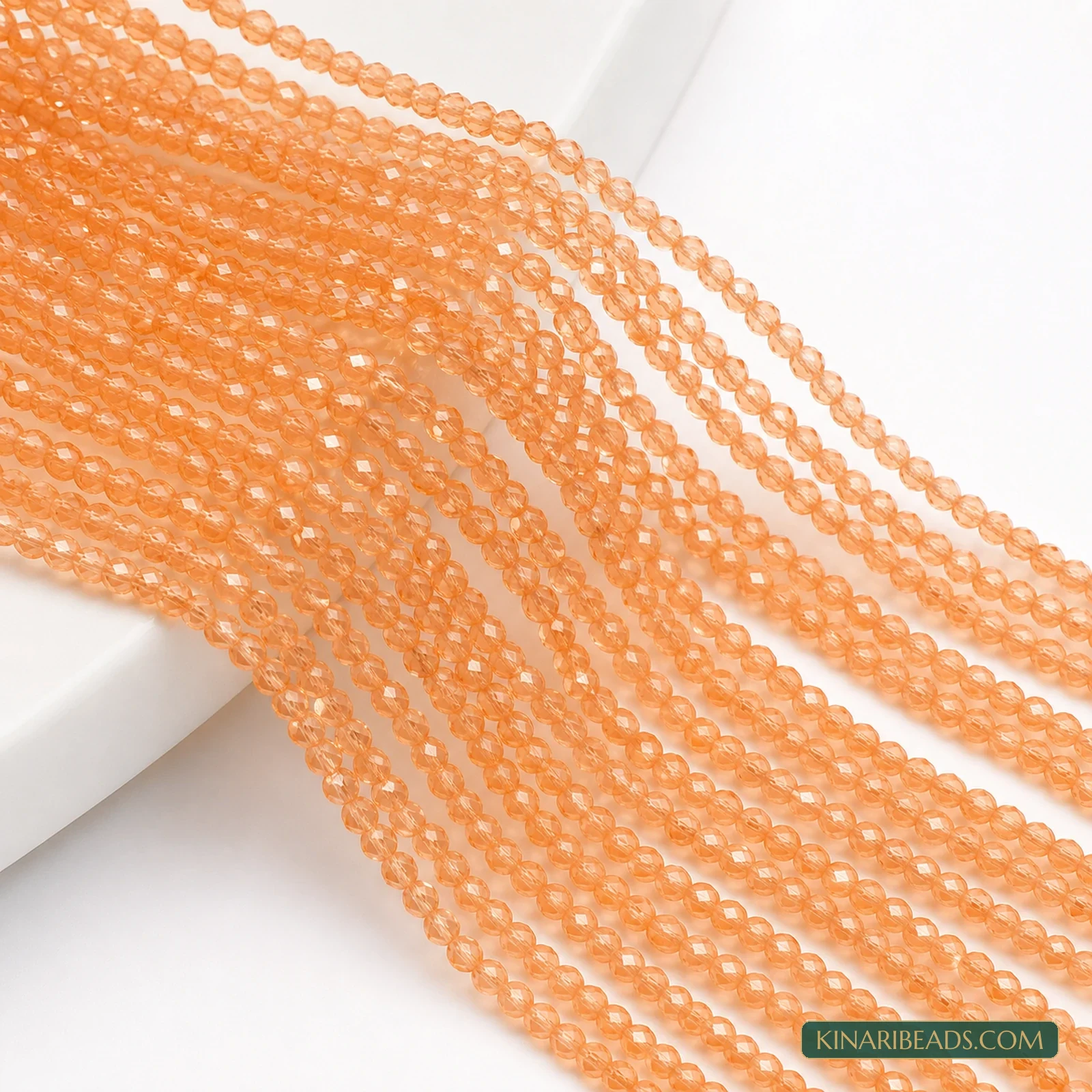2mm Hydro Crystal Faceted Football Beads – Pack of 5 Strings - Peach colour
