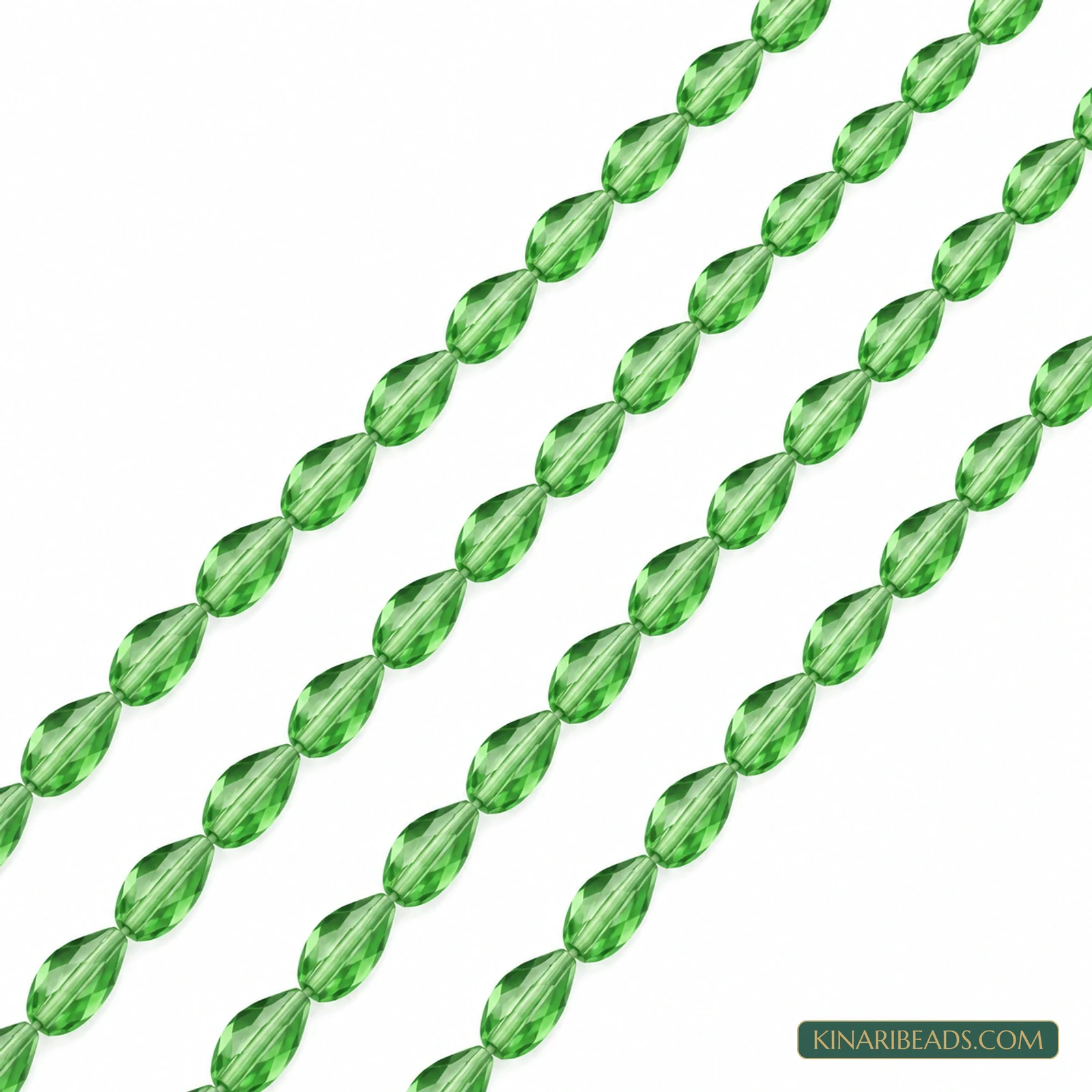 4x6mm Faceted Drop Transparent Glass Beads - 15 Inch String - Green colour