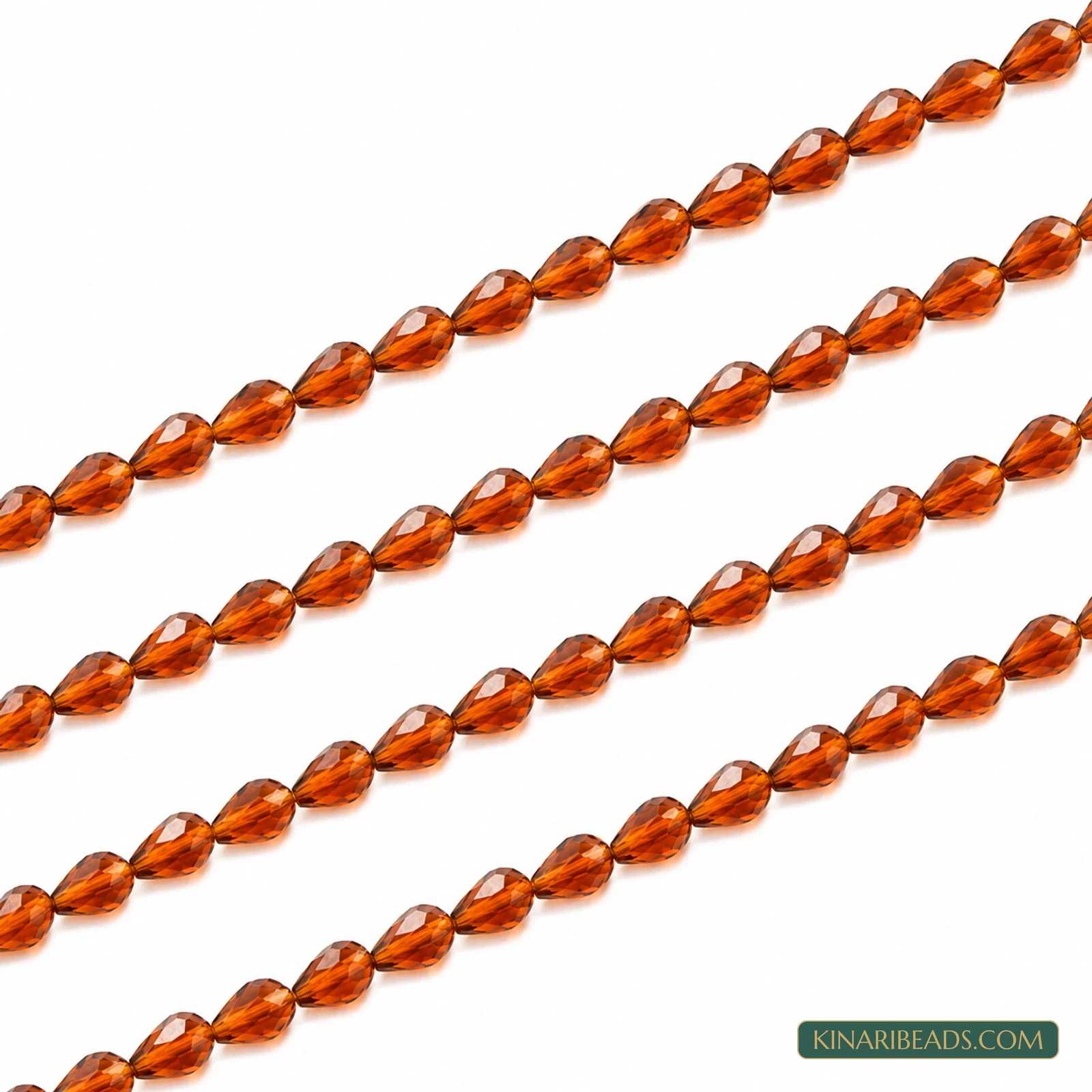 6x8mm Faceted Drop Transparent Glass Beads - 20 Inch String - Amber colour
